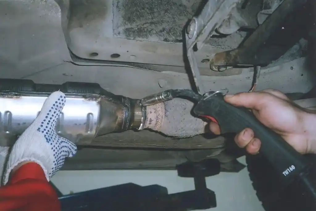 Car Exhaust Repair Job Is Done By The Certified Car Mechanic Of London Motor Sports