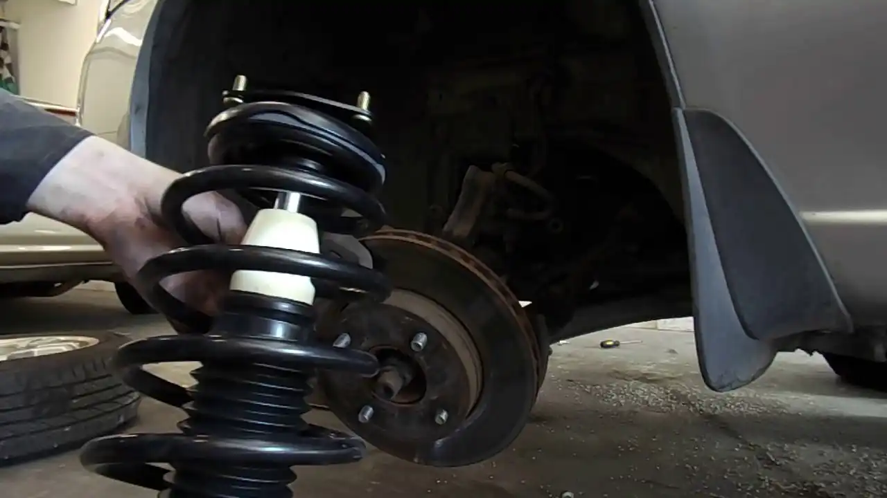 Car Shock Absorber Repair Job Is Done By Expert Mechanic Of London Motor Sports