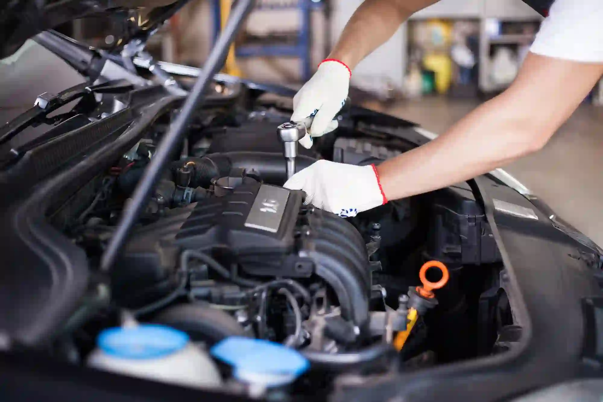 A Man Repairing Engine In Engine Repair Some Fuel System Parts Which Is Located In Engine