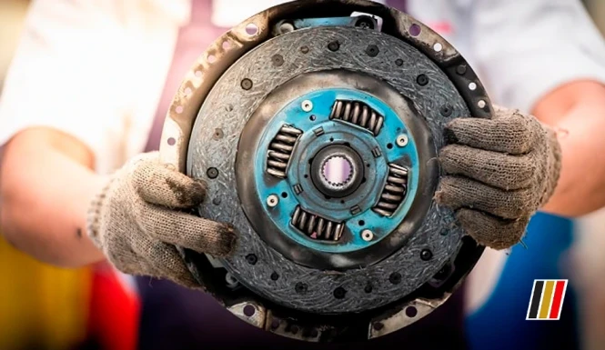 A Man Holding Clutch Of Car In His Hand